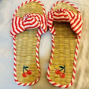 Cherry Red & White bamboo bottom sandals with red & white bows. They are cute🤗